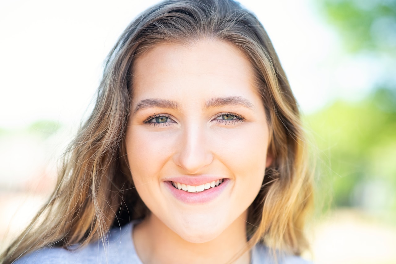 Happy dental patient with a confident smile at Willoughby Dental in Brooklyn NY
